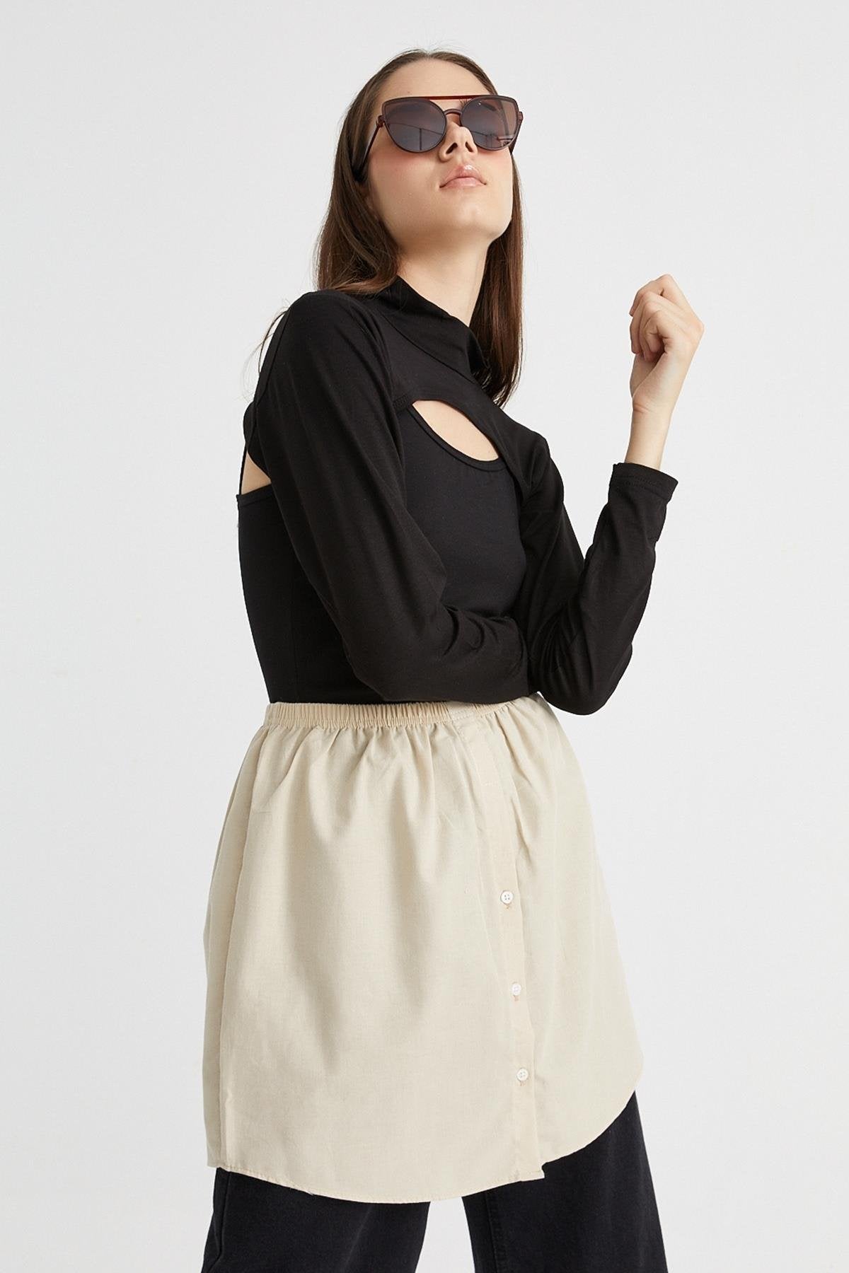 Tesettür etek üstü gömlek modelleri ile rahat ve şık kombin seçeneği