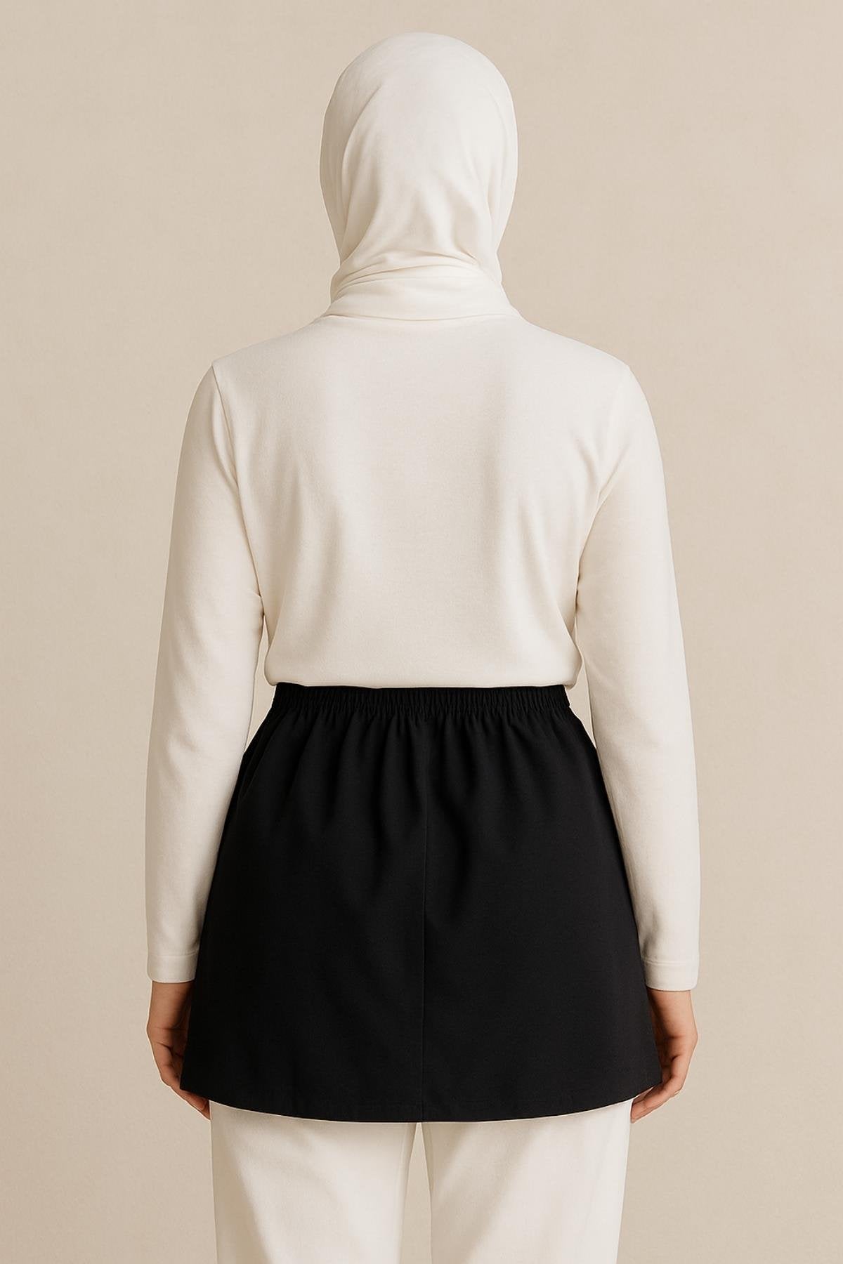 Tesettür etek üstü gömlek modelleri minimal ve modern görünüm